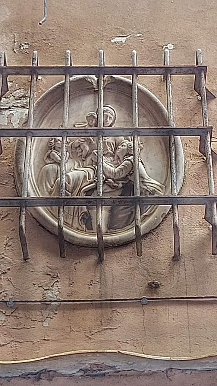 Madonna col Bambino, Santa Caterina da Genova e San Giovannino